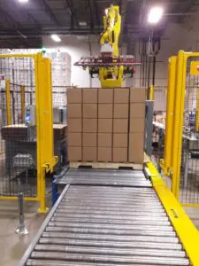 A conveyer belt with boxes on it